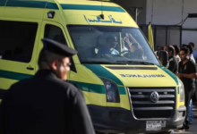 قوات الأمن المصرية في موقع العثور على شاب سوداني متوفي بالجيزة